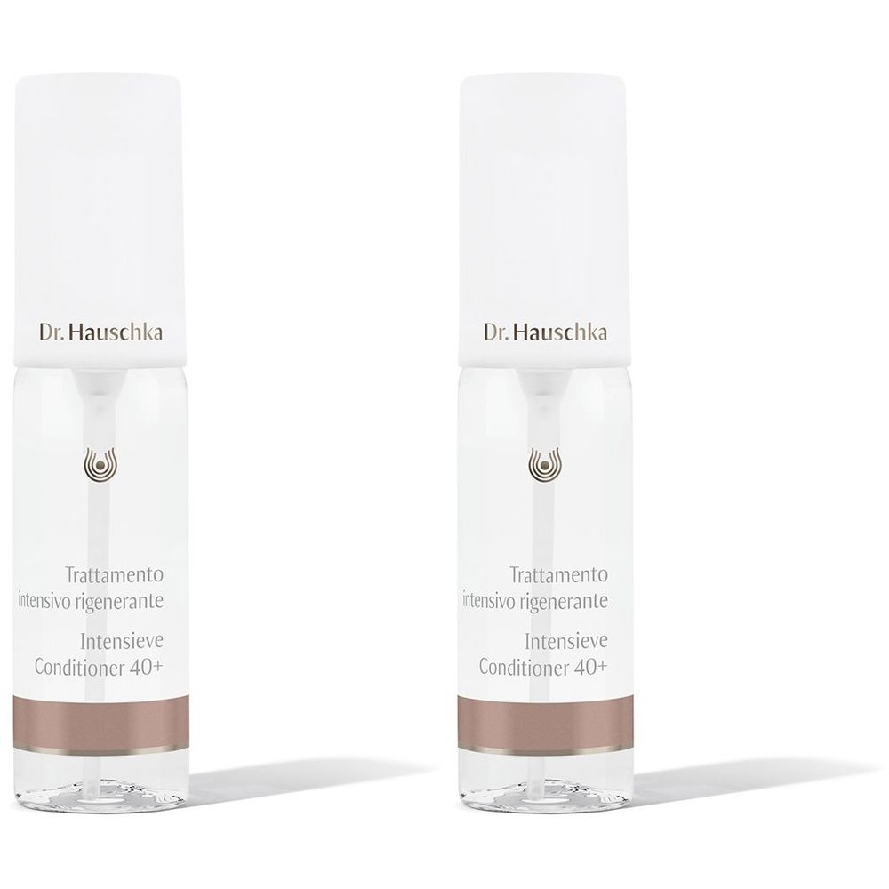 Deux flacons avec bouchon blanc et corps transparent. Inscription : Dr. Hauschka, Trattamento intensivo rigenerante, Intensieve Conditioner 40+.