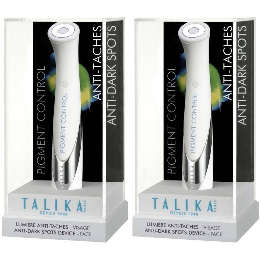 Deux appareils blancs avec "PIGMENT CONTROL" et "ANTI-TACHES". Emballés dans des présentoirs transparents avec la marque TALIKA.