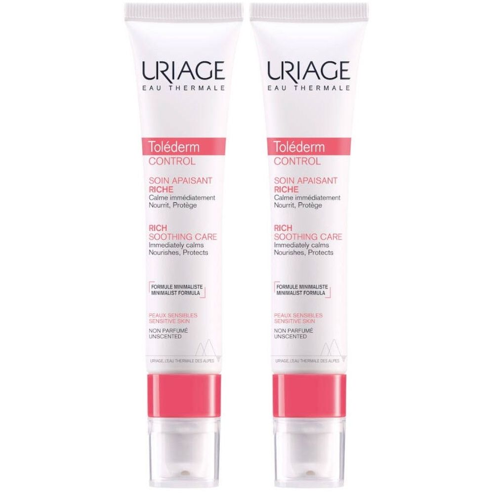 Deux tubes de Uriage Toléderm CONTROL. Blancs, avec des accents roses et des inscriptions. Inscription : Soin Apaisant Riche.