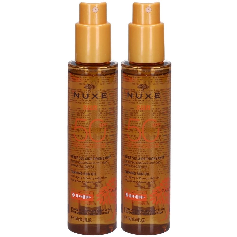 Deux flacons spray NUXE Huile solaire visage & corps SPF 50. Flacons dorés avec vaporisateurs jaunes. Texte sur les étiquettes.
