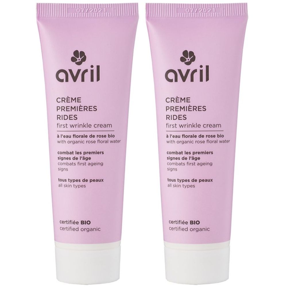 Zwei Tuben Creme Premières Rides von Avril. Rosa Tuben mit weißem Verschluss. Text: Crème Premières Rides, zertifiziert Bio.