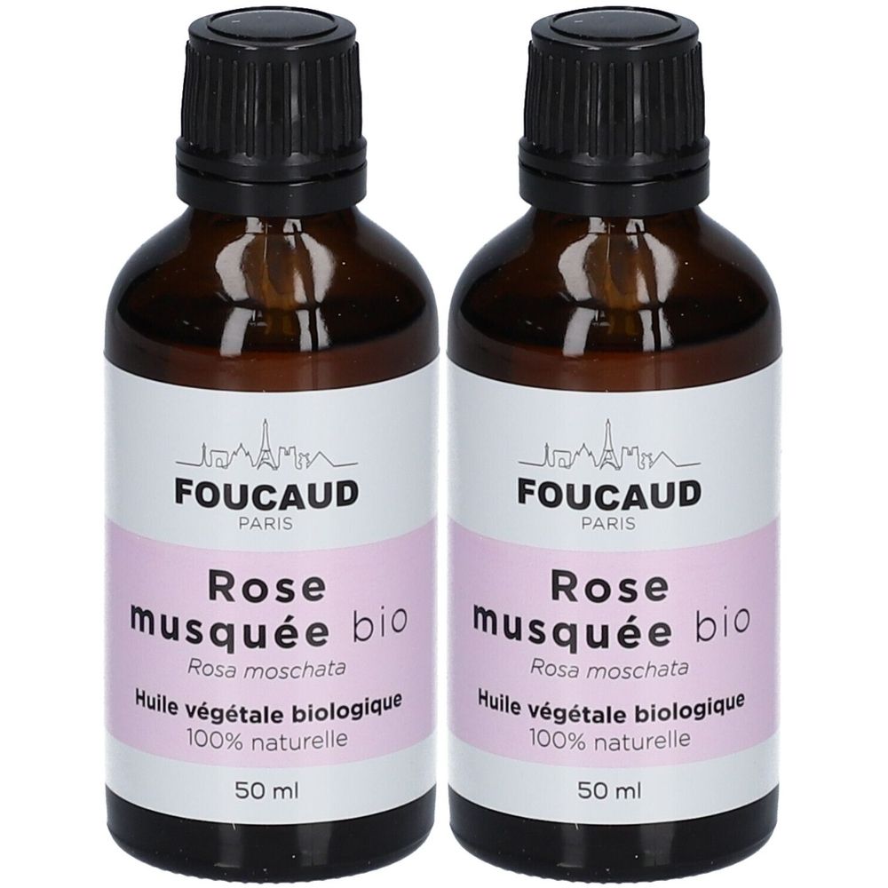 Zwei Flaschen FOUCAUD Rose musquée bio. Braune Glasflaschen mit schwarzem Deckel und weißem Etikett mit rosa Schrift. 50 ml.