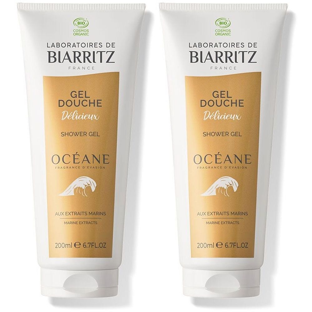 Zwei Tuben Duschgel. Weiß, mit goldfarbenem Mittelteil. Aufschrift: Laboratoires de Biarritz, Gel Douche Délicieux, Océane. Mit Bio-Siegel.