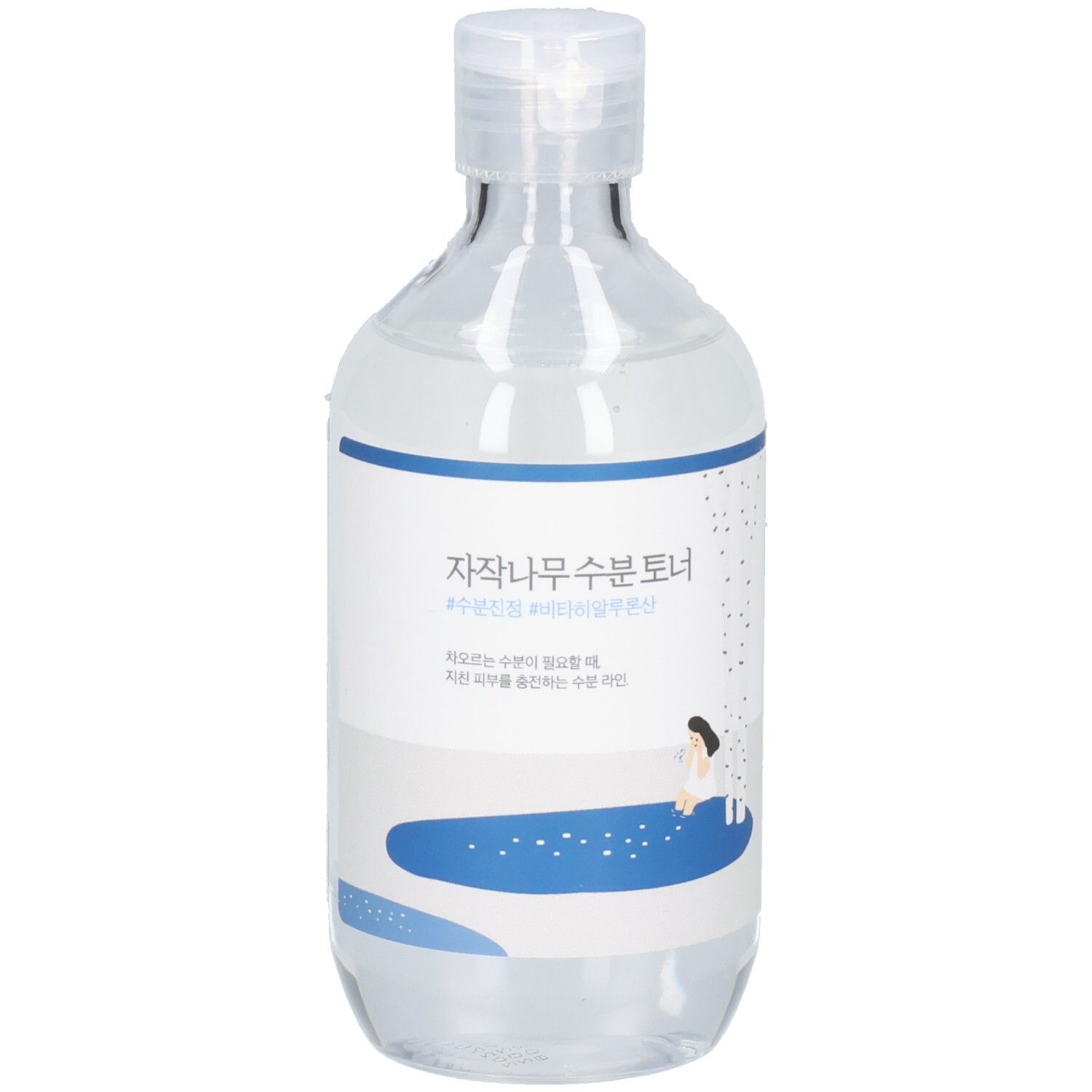 Transparente Flasche mit blau-weißem Etikett. Aufschrift in koreanischer Schrift. Deckel oben.