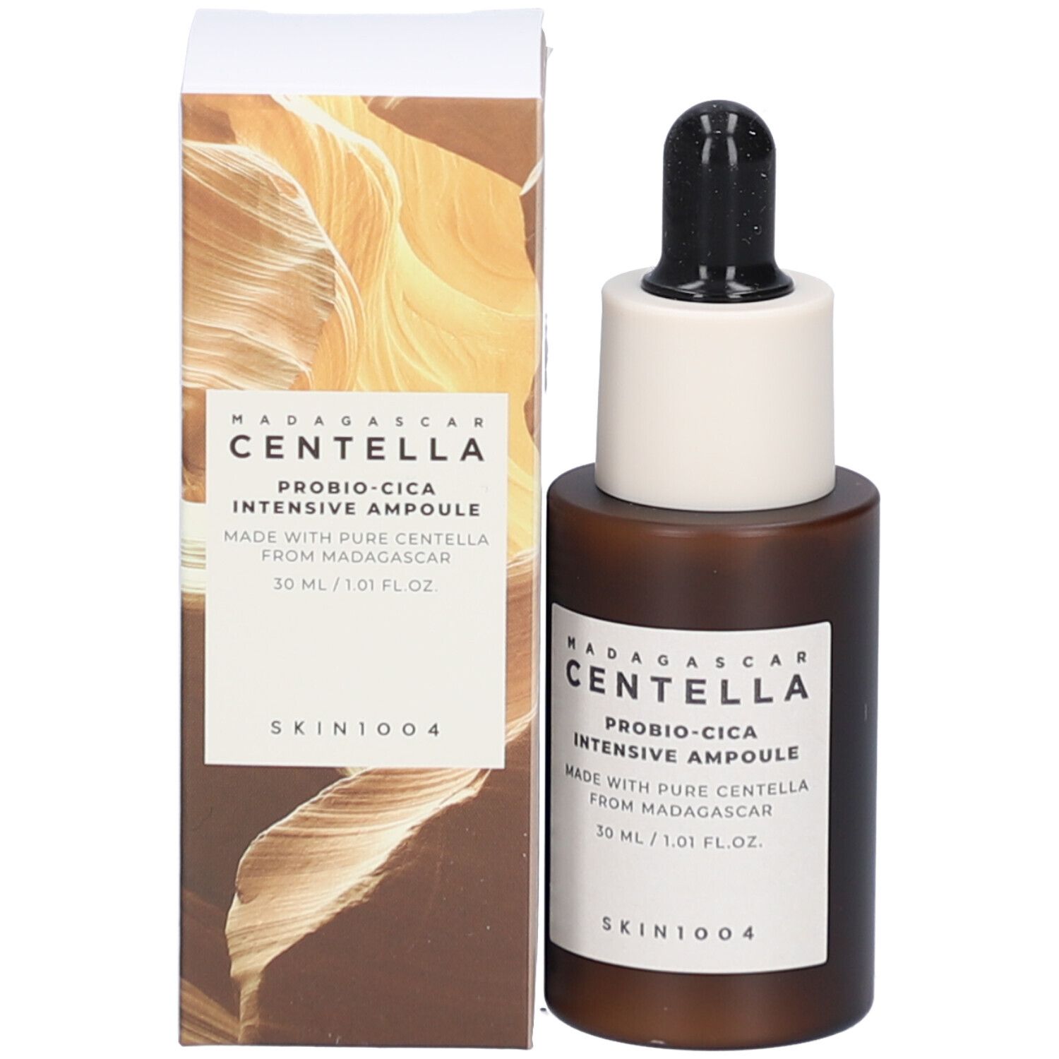 Serumflasche und Verpackung. Braune Flasche mit weißem Aufsatz und schwarzer Pipette. SKIN1004.