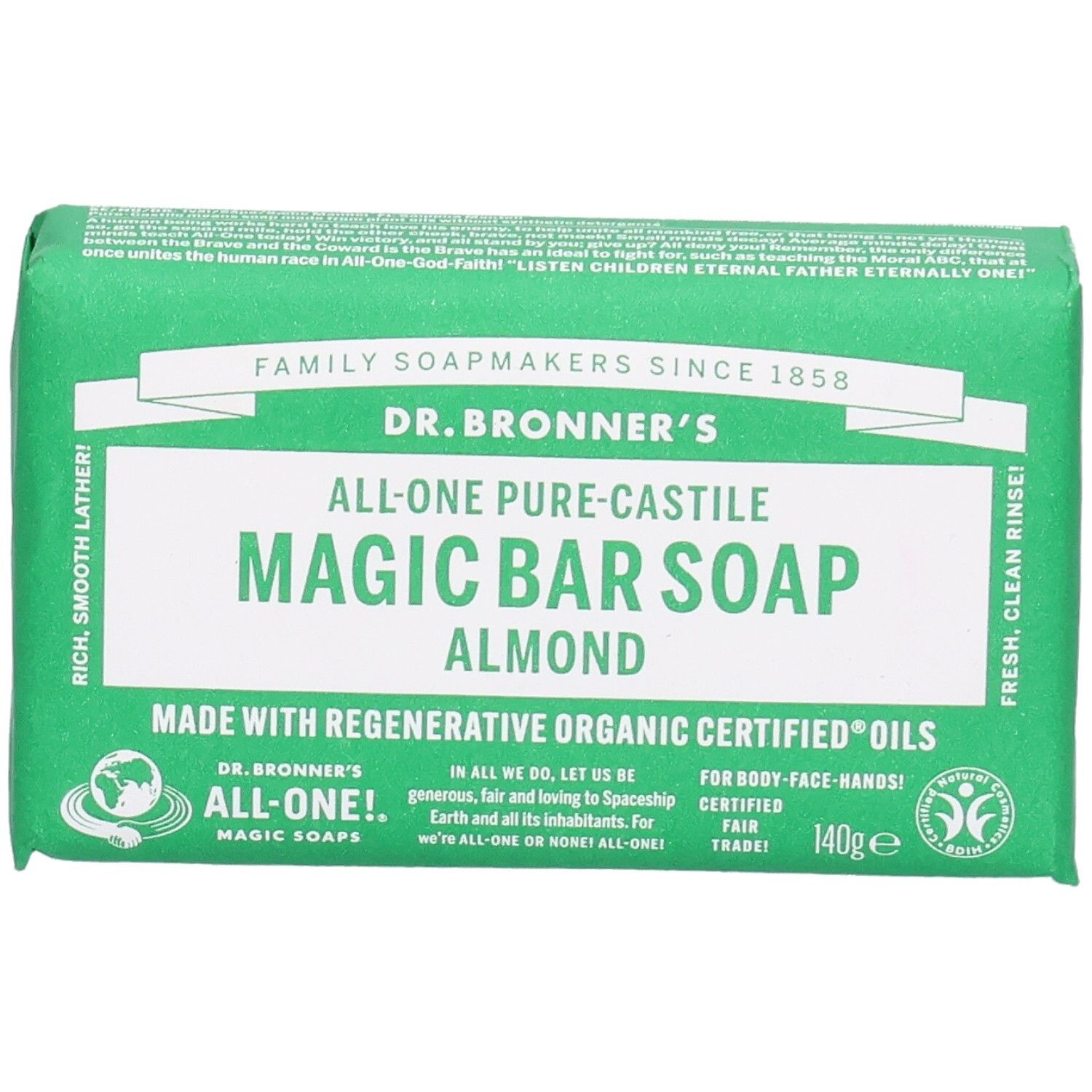 Grüne Seife in Papierverpackung. Aufschrift: Dr. Bronner's Magic Bar Soap Almond. Fair Trade Siegel.