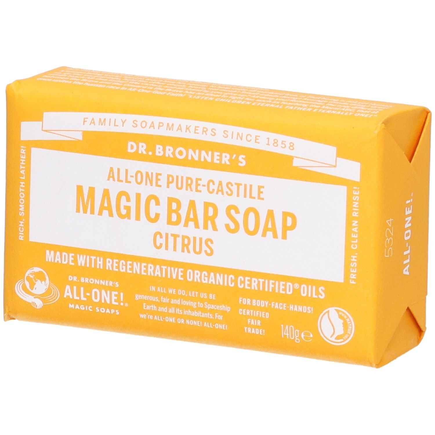 Gelbes Seifenstück in Papierverpackung. Aufschrift: Dr. Bronner's Magic Bar Soap Citrus. Zertifizierungen.