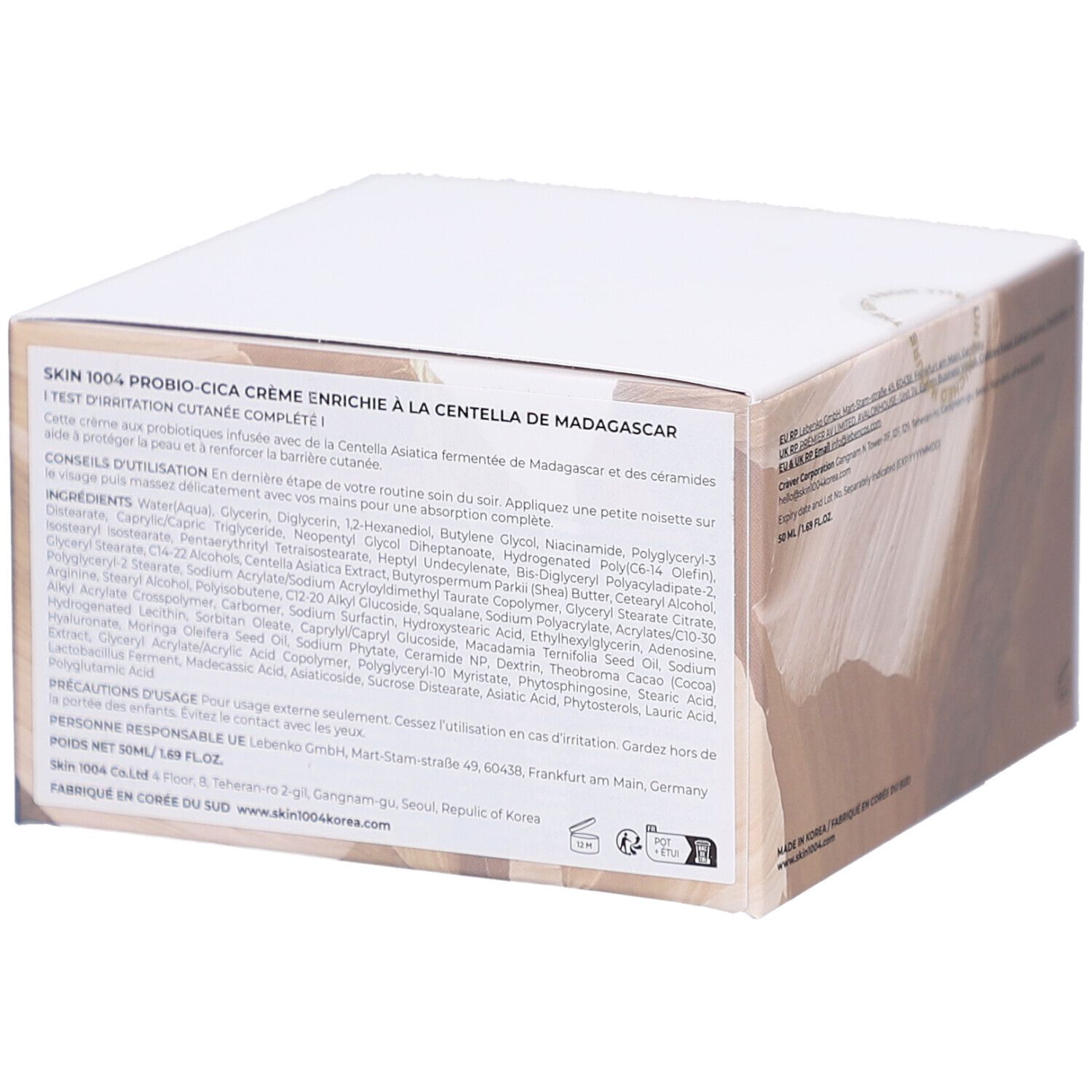 Rückseite des weißen Kartons. Text: SKIN1004, Produktinformationen, Inhaltsstoffe, Herkunft.