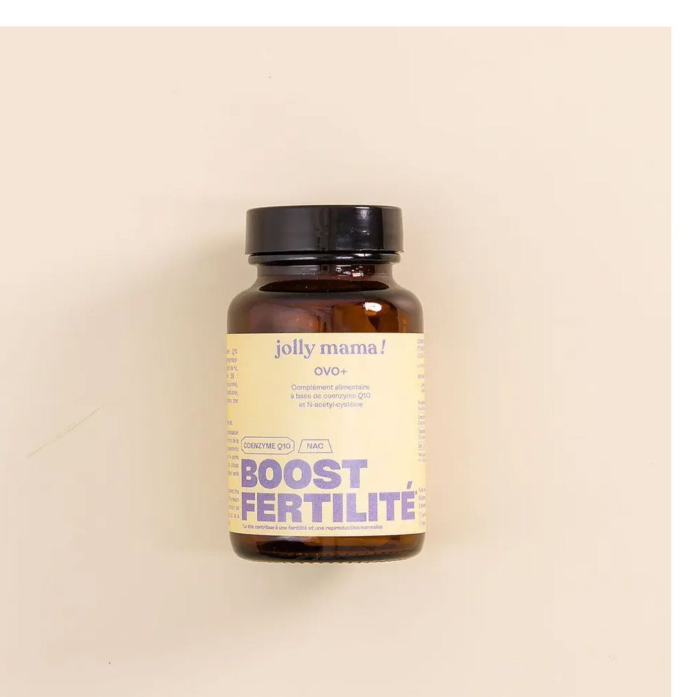 Un flacon en verre brun avec un couvercle noir. L'étiquette indique "jolly mama! ovo+" et "BOOST FERTILITE".