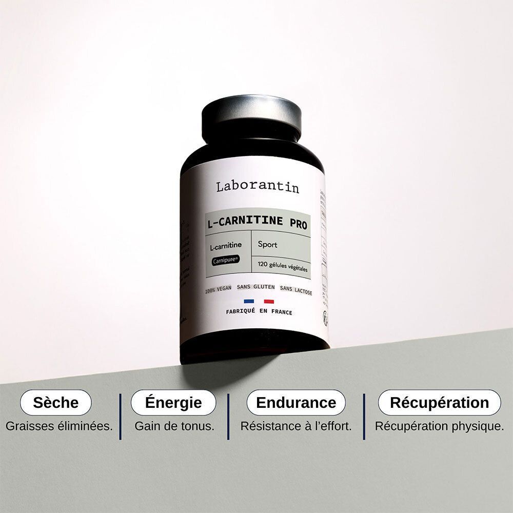 Flacon Laborantin L-Carnitine Pro. Flacon noir, bouchon argenté. Étiquette blanche. Mots: Sèche, Energie, Endurance, Récupération.