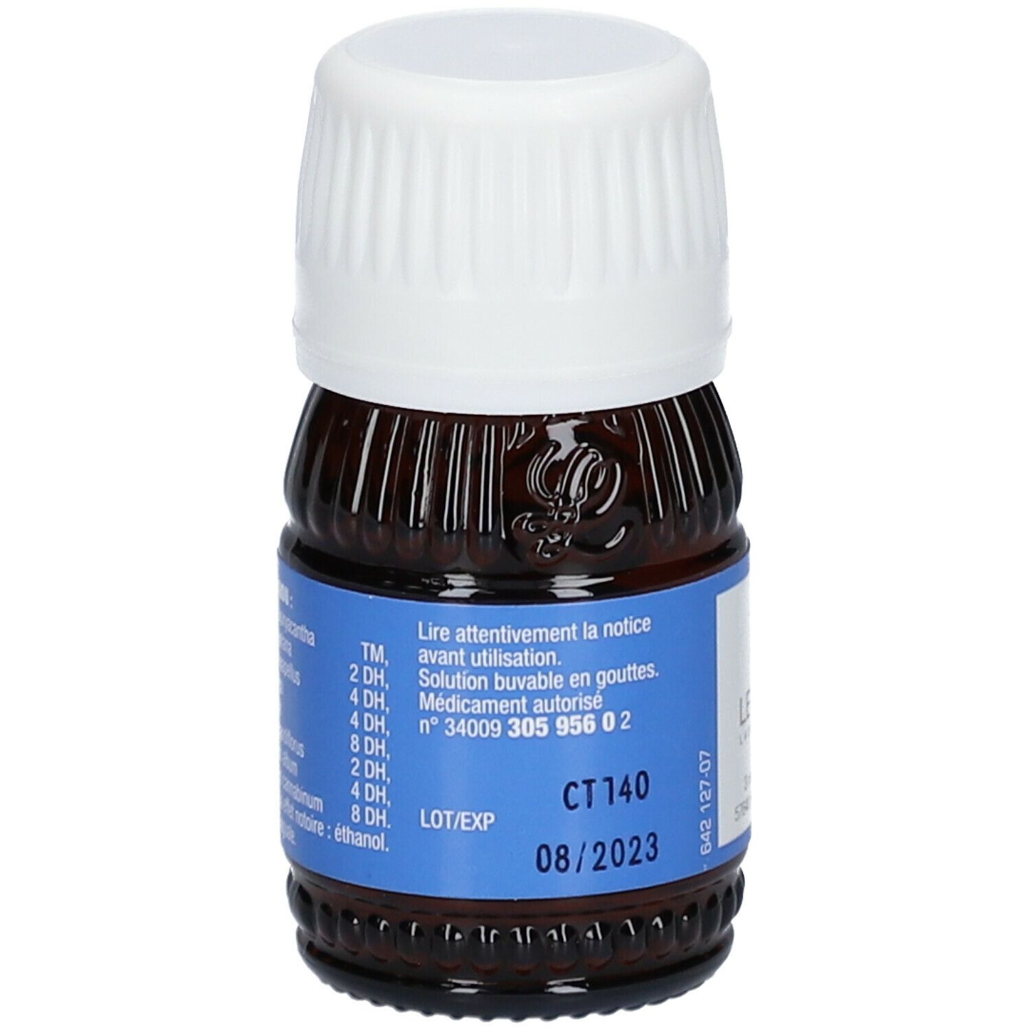 Flacon en verre brun avec bouchon blanc. Étiquette bleue avec texte. Numéro de lot et date de péremption.