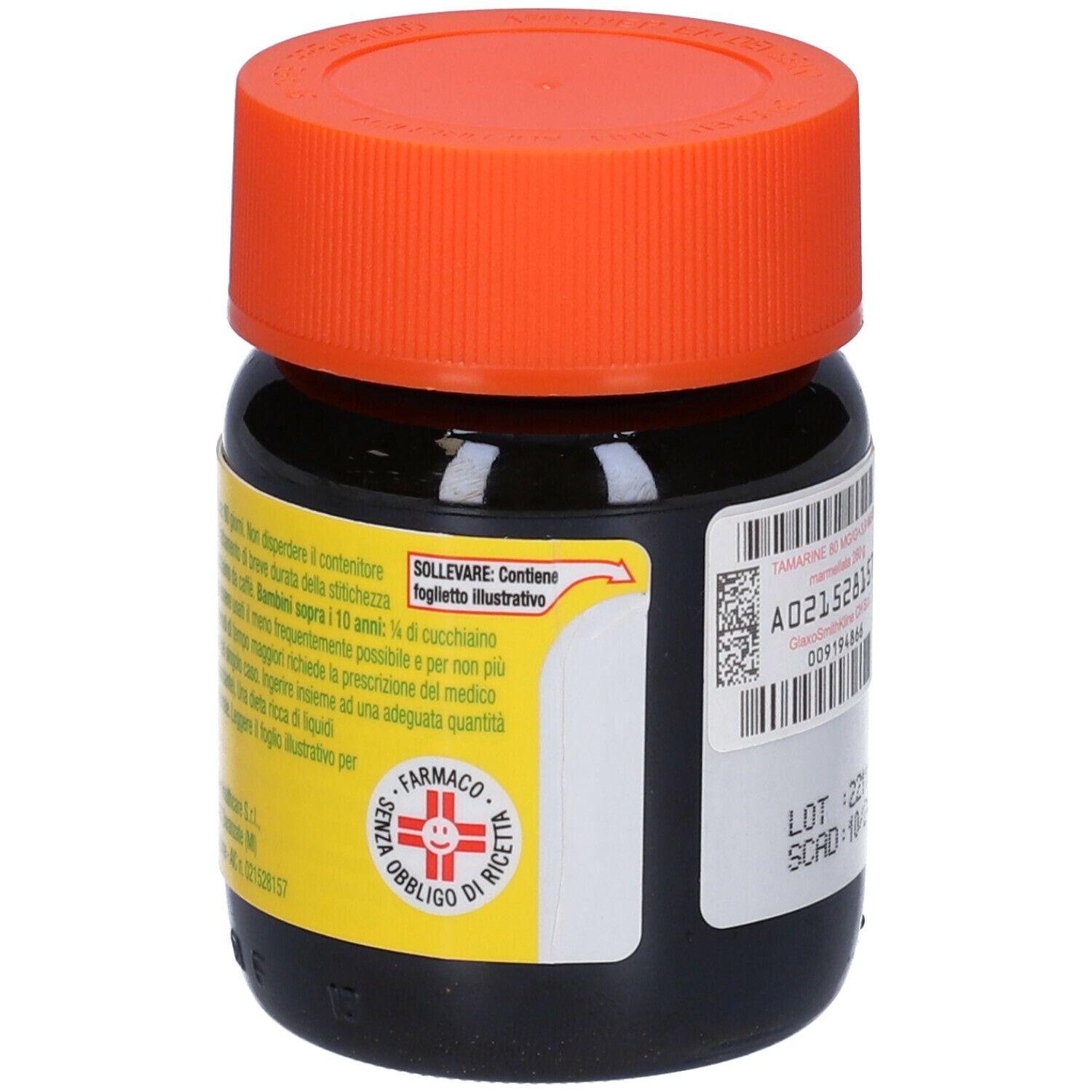 Vasetto di vetro marrone con coperchio arancione. Scritta TAMARINE. Etichetta con informazioni e una freccia.