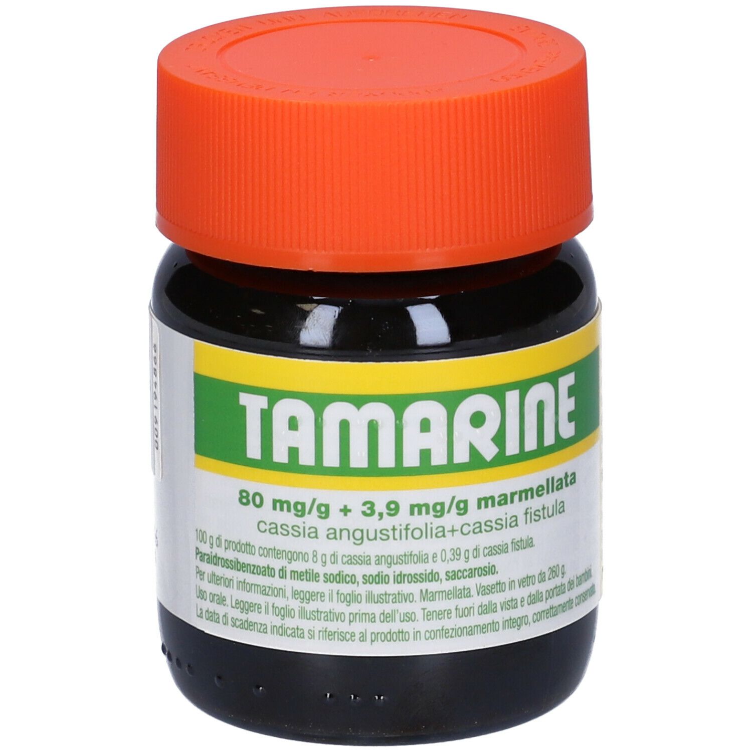 Vasetto di vetro marrone con coperchio arancione. Scritta TAMARINE. Etichetta gialla con informazioni sul prodotto.