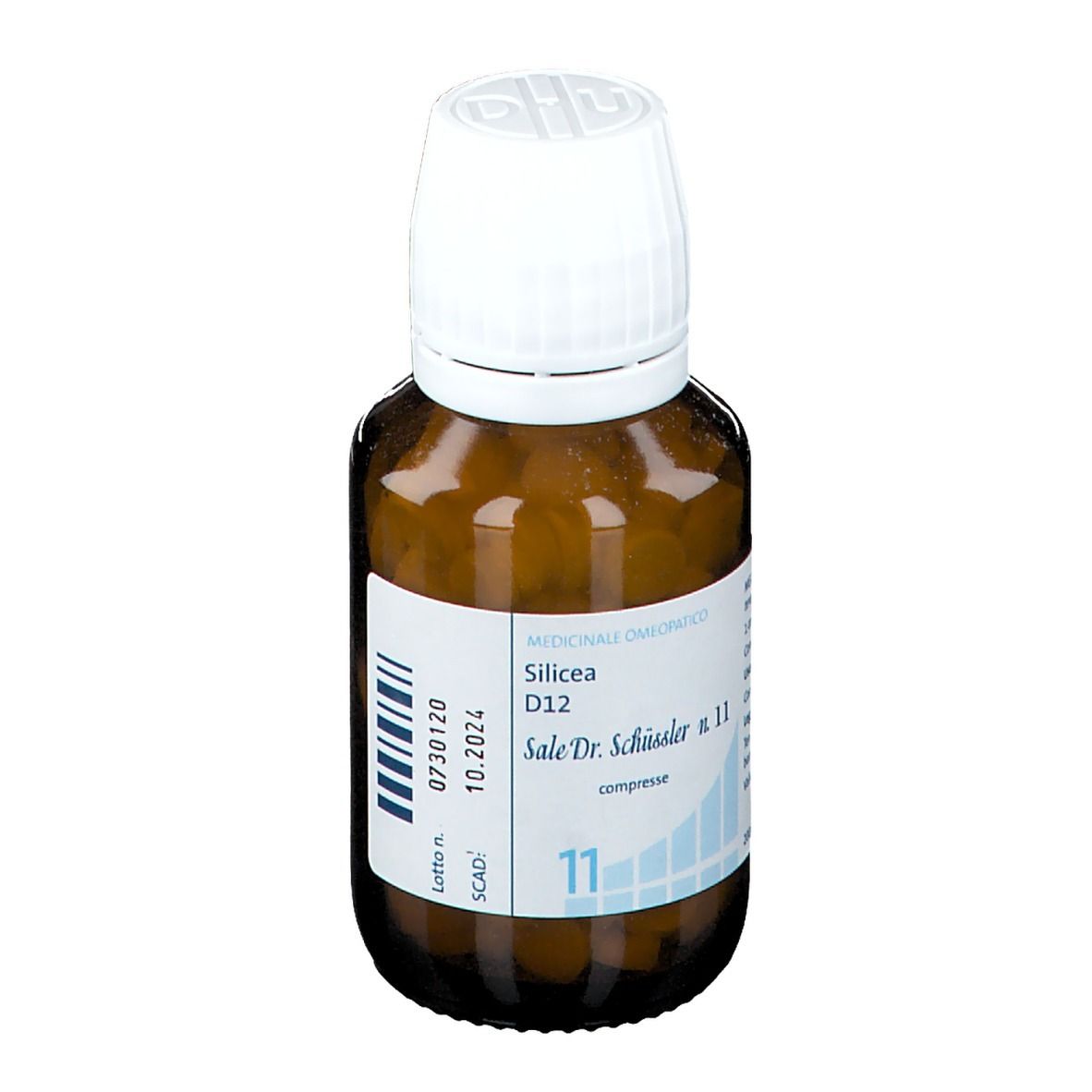 Flacone di vetro marrone con tappo bianco. Etichetta con informazioni. Scritta Silicea D12, Sale Dr. Schüssler n. 11.