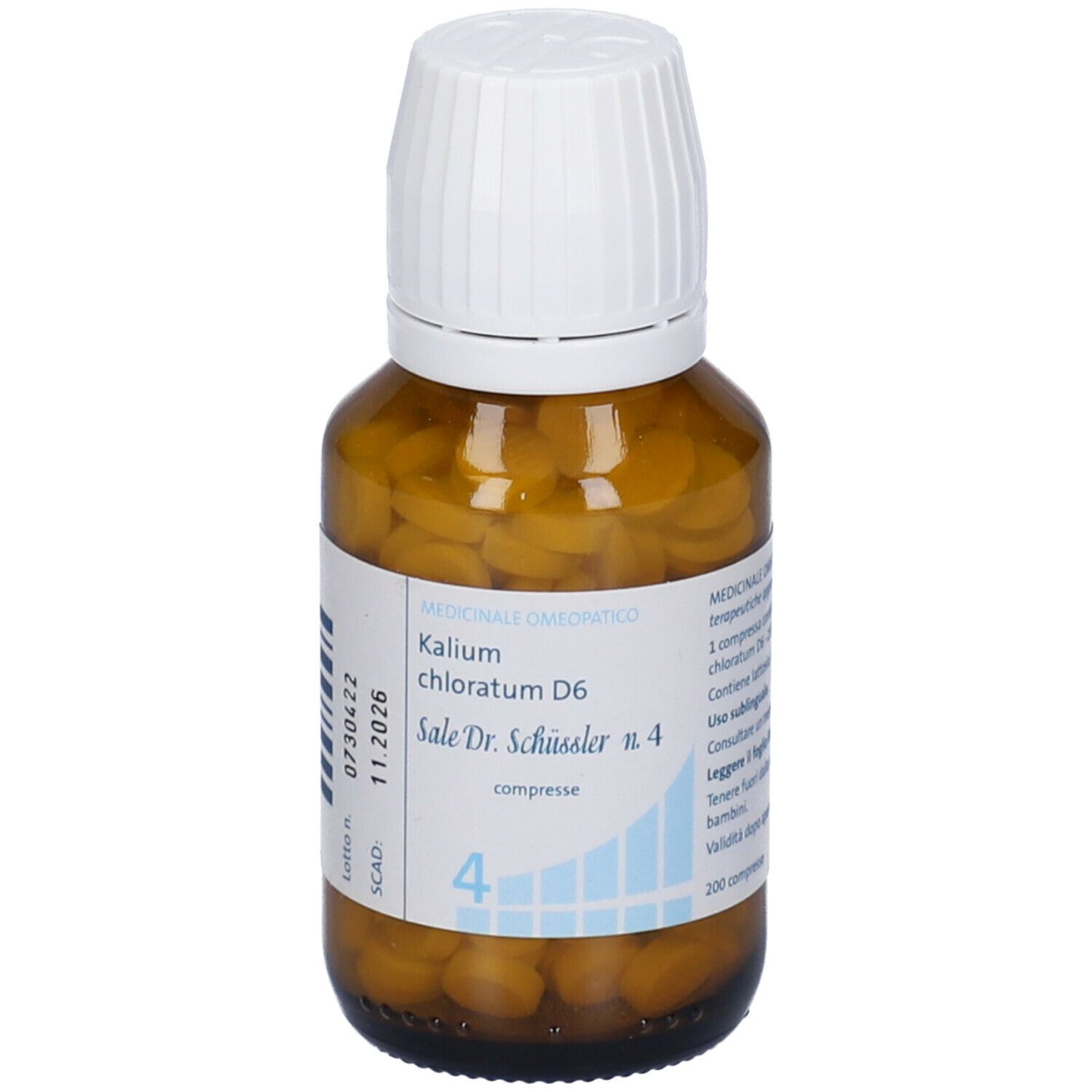 Flacone di vetro marrone con compresse. Sull'etichetta: Kalium chloratum D6, numero di lotto e data di scadenza.