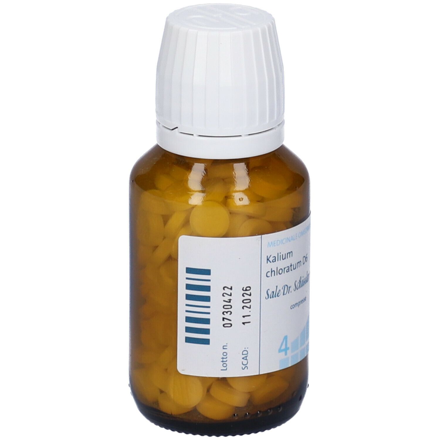 Flacone di vetro marrone con compresse. Sull'etichetta: Kalium chloratum D6, numero di lotto e data di scadenza.