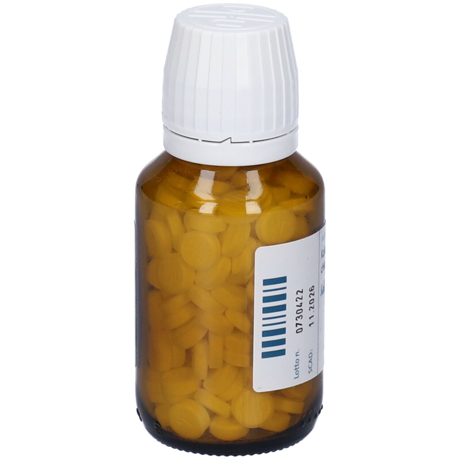 Flacone di vetro marrone con compresse. Sull'etichetta: Kalium chloratum D6, numero di lotto e data di scadenza.