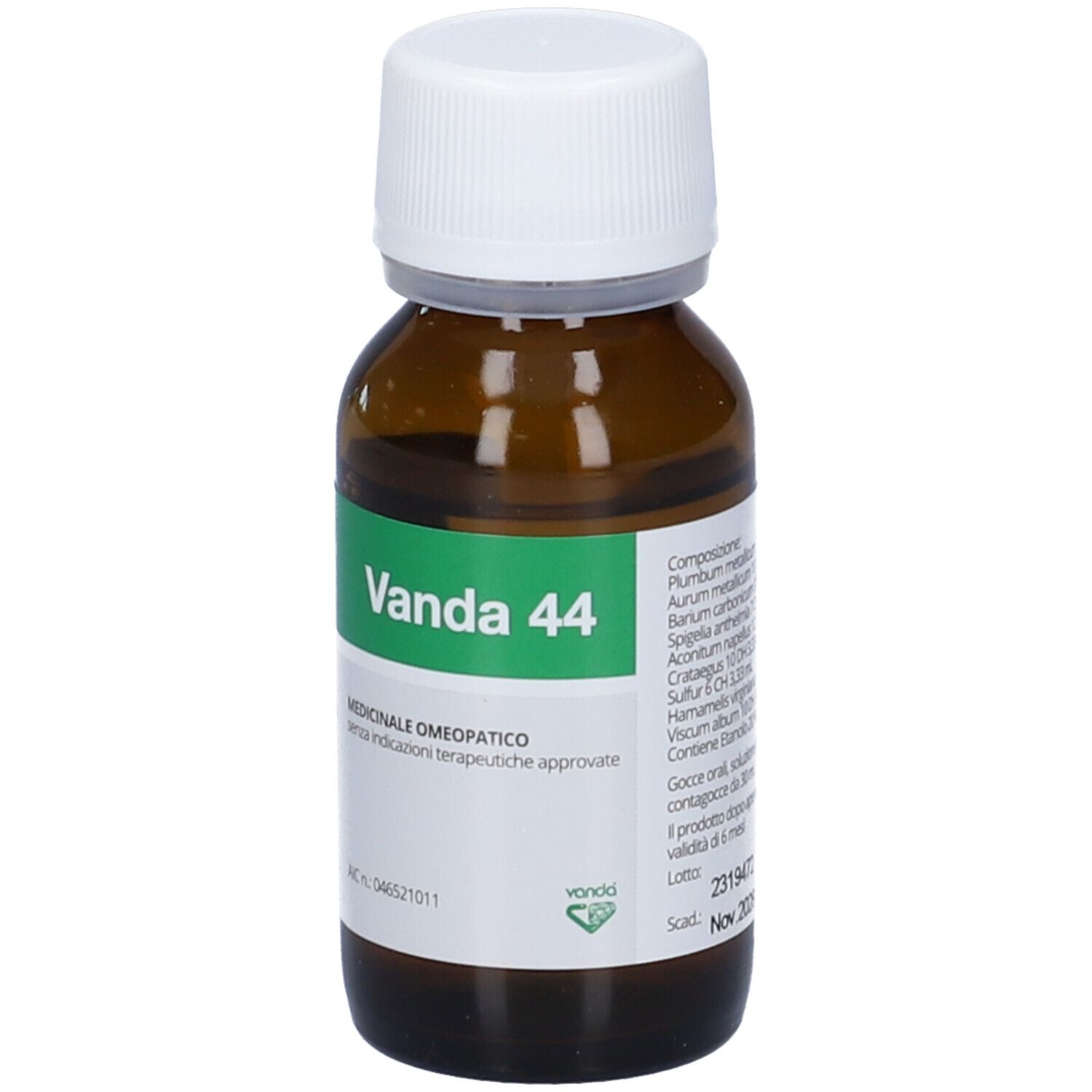 Flacone di vetro marrone con tappo bianco. Etichetta verde con informazioni sul prodotto. Scritta: Vanda 44.