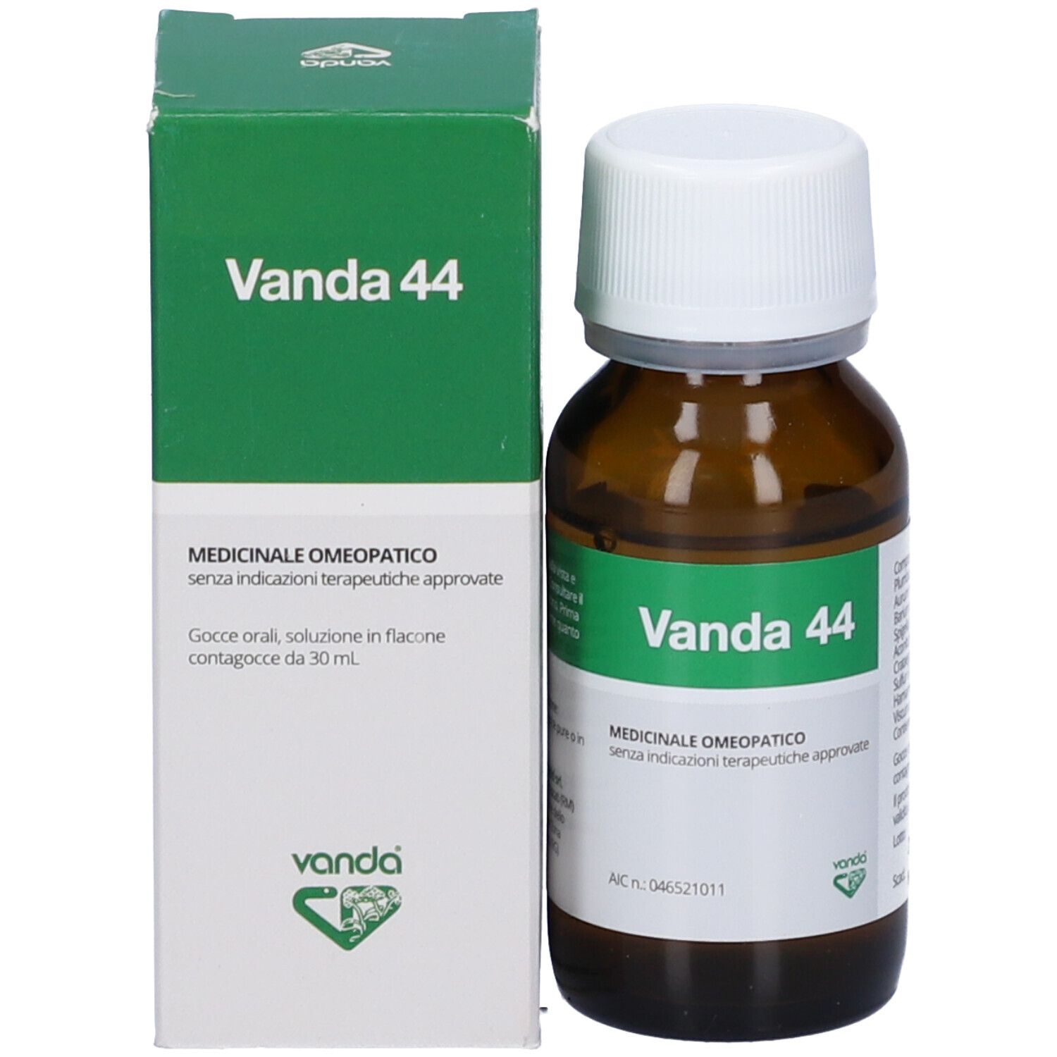 Flacone e confezione del prodotto. Scatola verde con scritta bianca: Vanda 44. Flacone marrone accanto.
