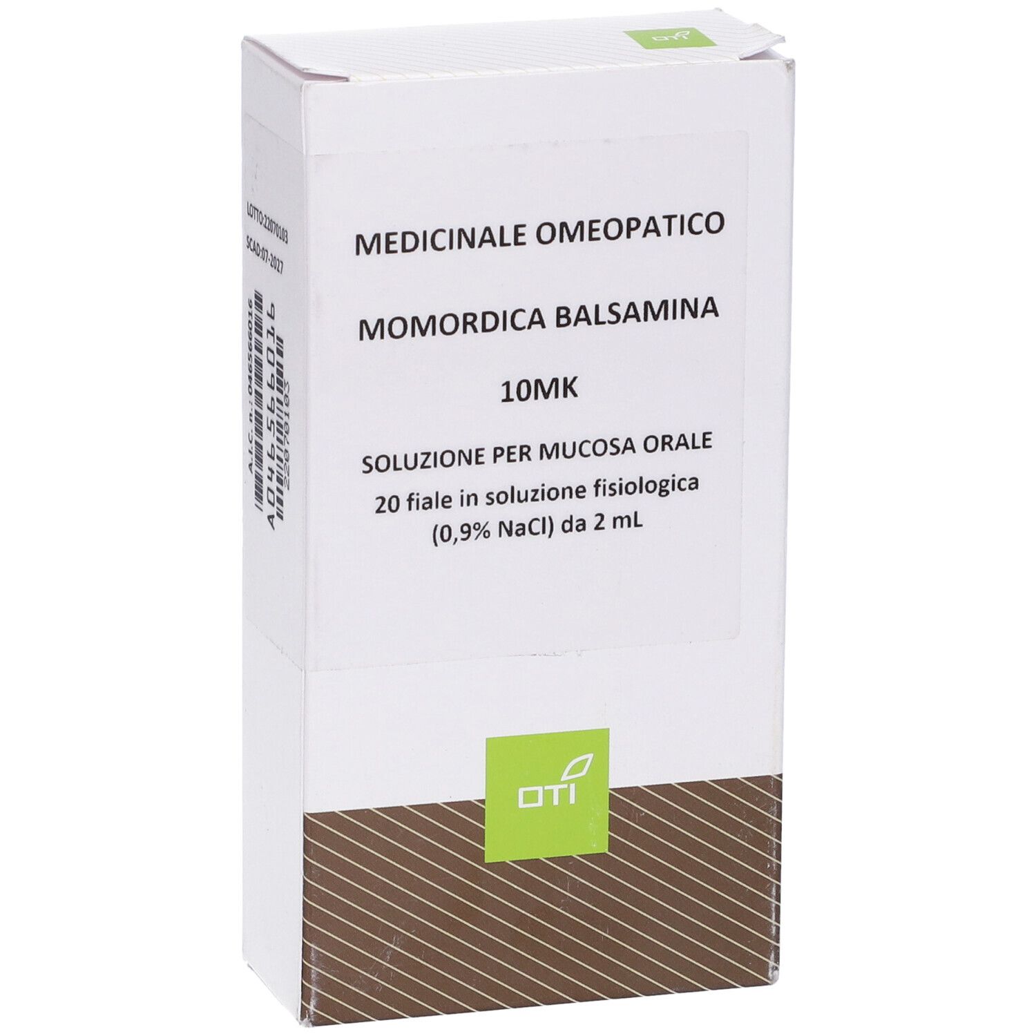 Scatola bianca con informazioni prodotto. Testo: Momordica Balsamina 10MK, 20 fiale, soluzione per mucosa orale. Logo OTI.