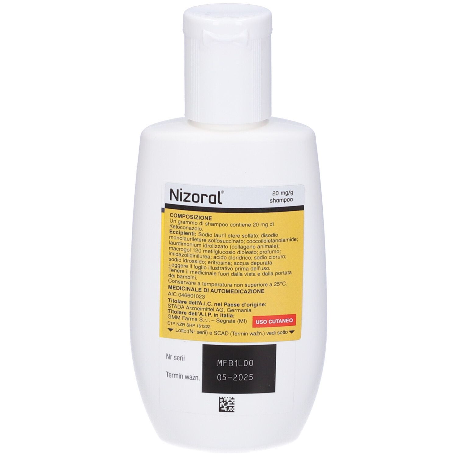 Retro del flacone bianco. Etichetta con ingredienti e "Nizoral 20 mg/g shampoo".