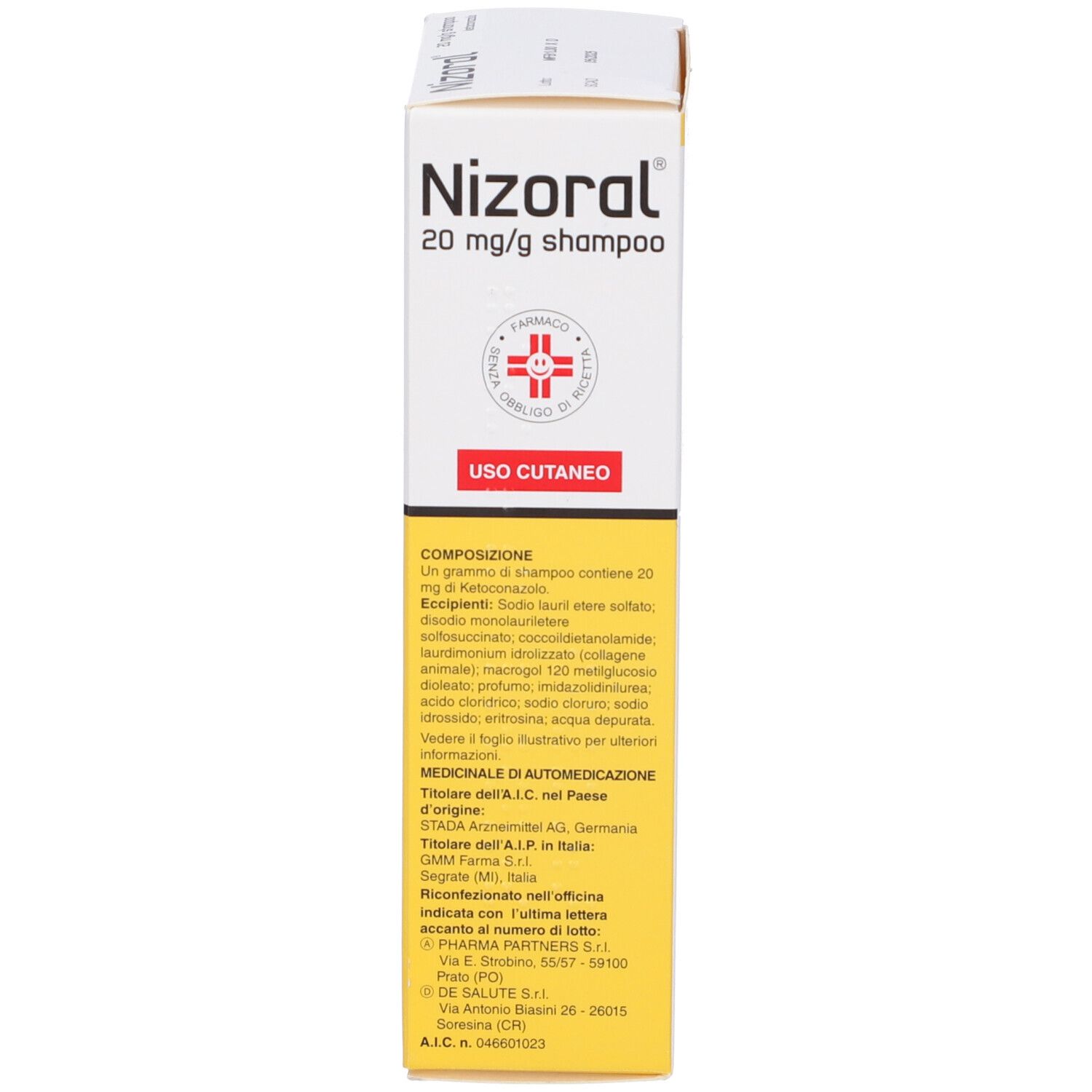 Scatola con "Nizoral 20 mg/g shampoo". Campo giallo con testo e croce rossa.