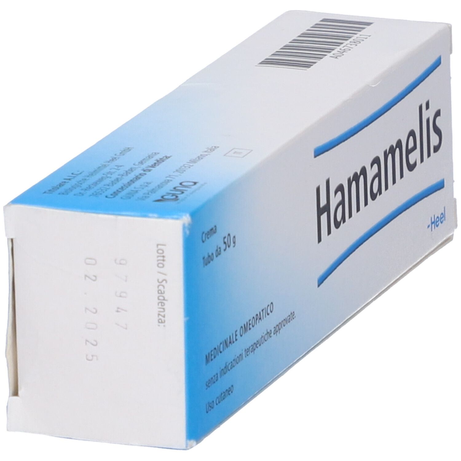 Scatola di crema Hamamelis, in diagonale. Confezione blu e bianca. Testo: Hamamelis, Heel, 50 g.