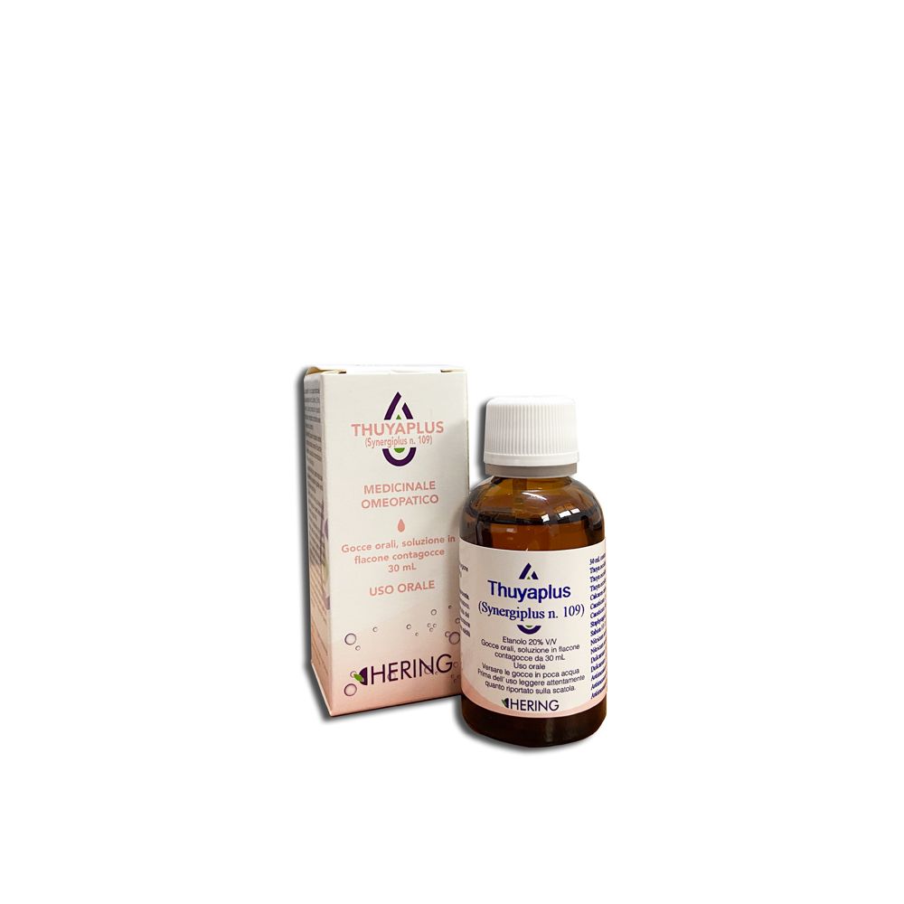 Flacone di vetro marrone con tappo bianco e scatola. Scritta: Thuyaplus, Hering. Gocce medicinali.