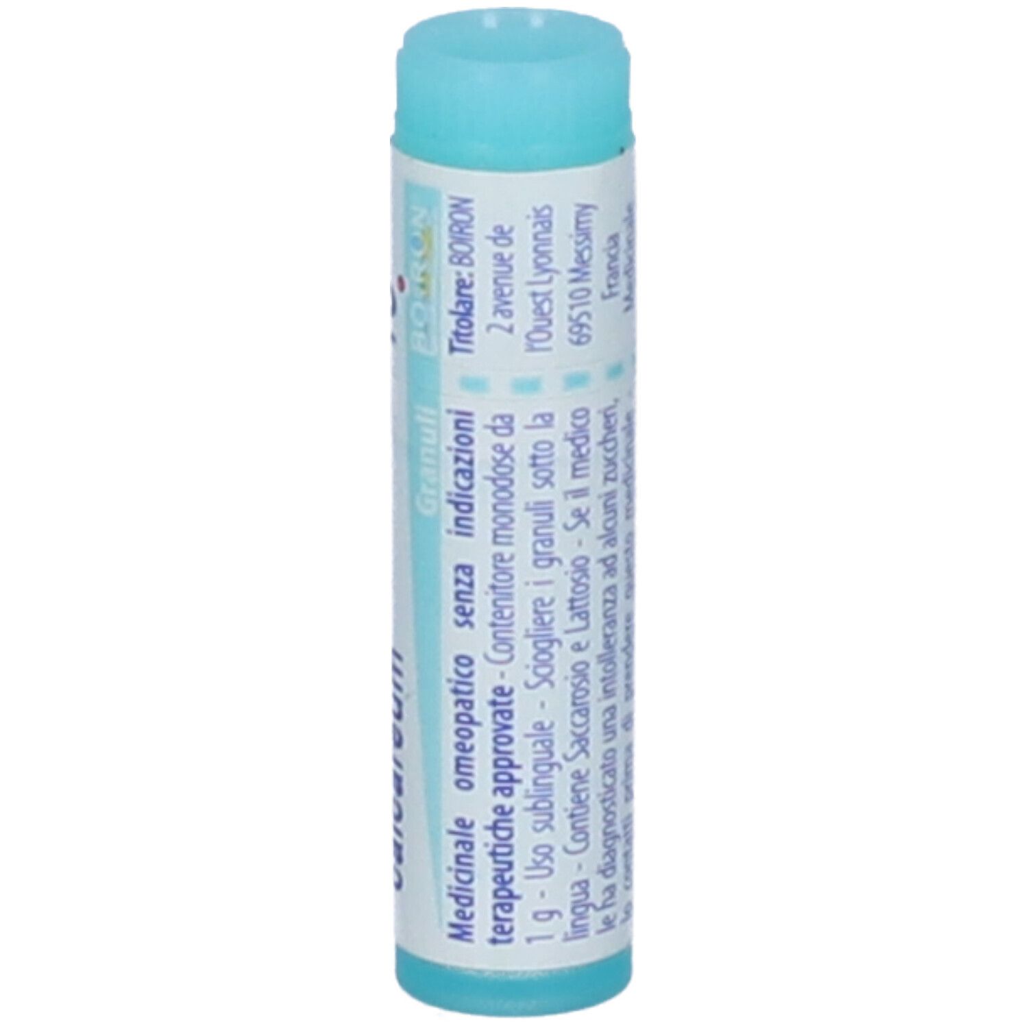 Confezione cilindrica. Tappo blu. Testo con ingredienti, dosaggio e produttore.