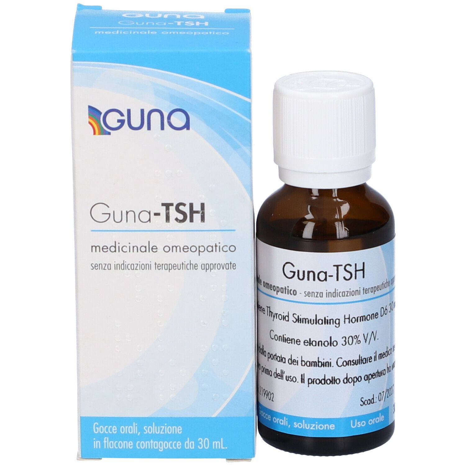Flacone e scatola. Flacone marrone, tappo bianco. Scatola blu e bianca con logo Guna-TSH.