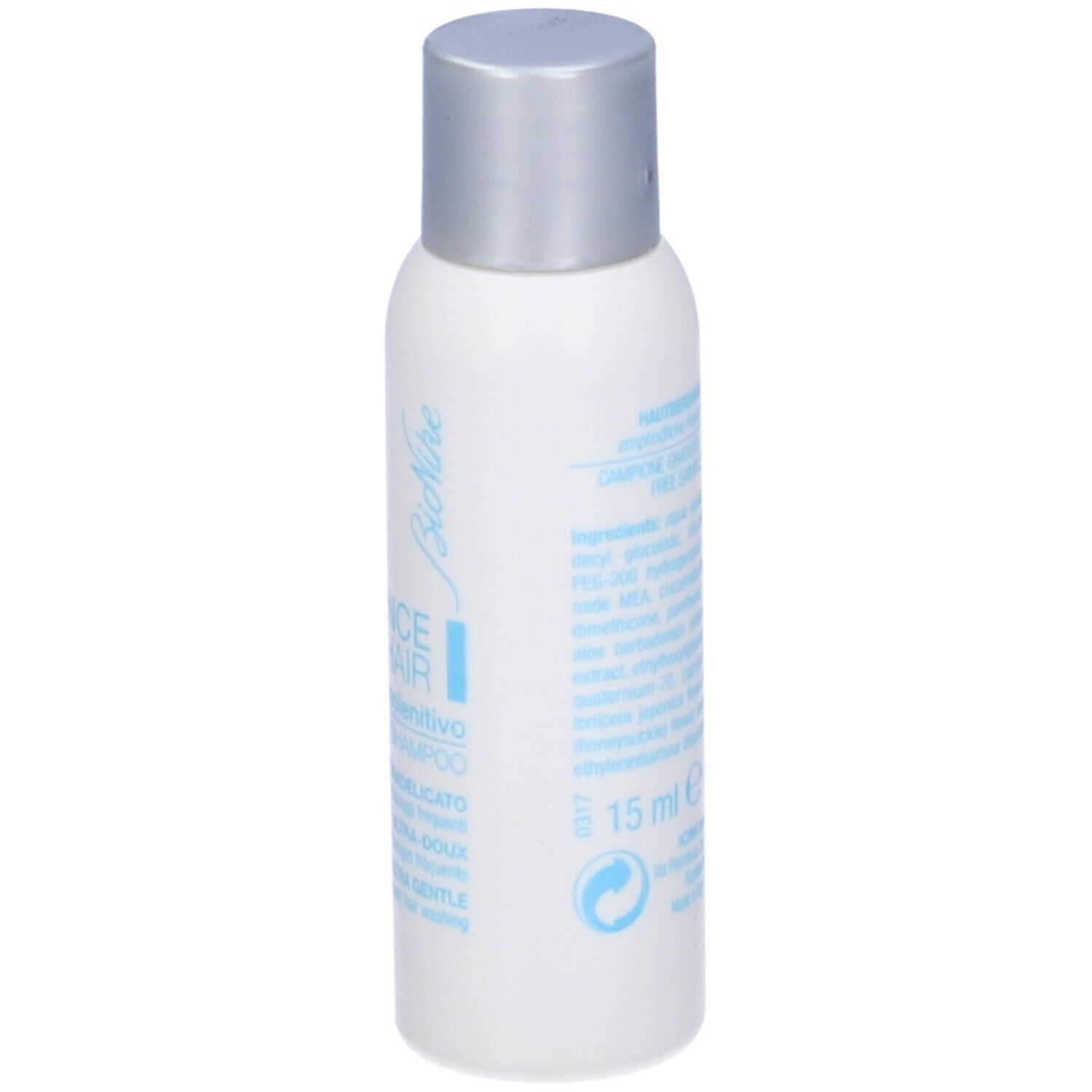 Flacone bianco, tappo argento. Testo: Bionike, Defence Hair, Dermolenitivo Shampoo. 15 ml.
