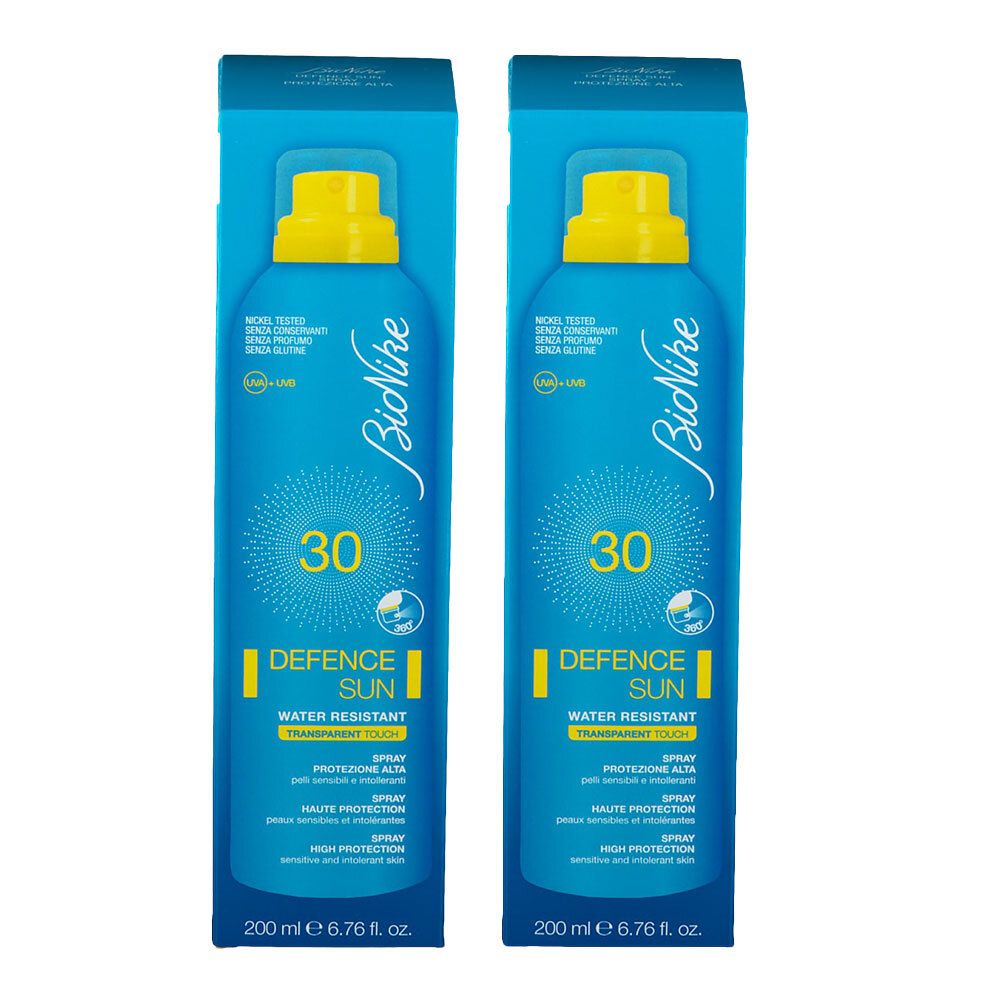 Due spray blu con erogatore giallo. Scritta: BioNike, 30, DEFENCE SUN, resistente all'acqua. 200 ml.
