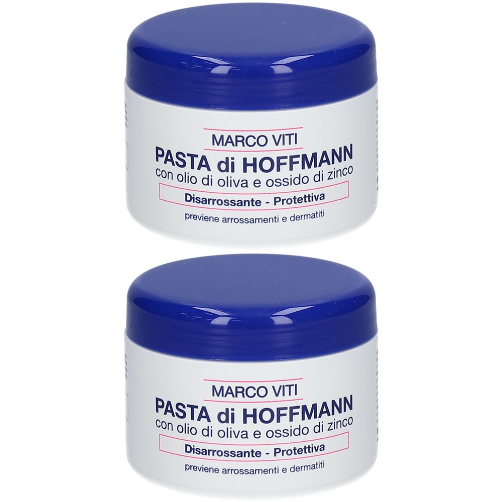Due vasetti bianchi con coperchi blu. Scritta: PASTA di HOFFMANN, Disarrossante - Protettiva.