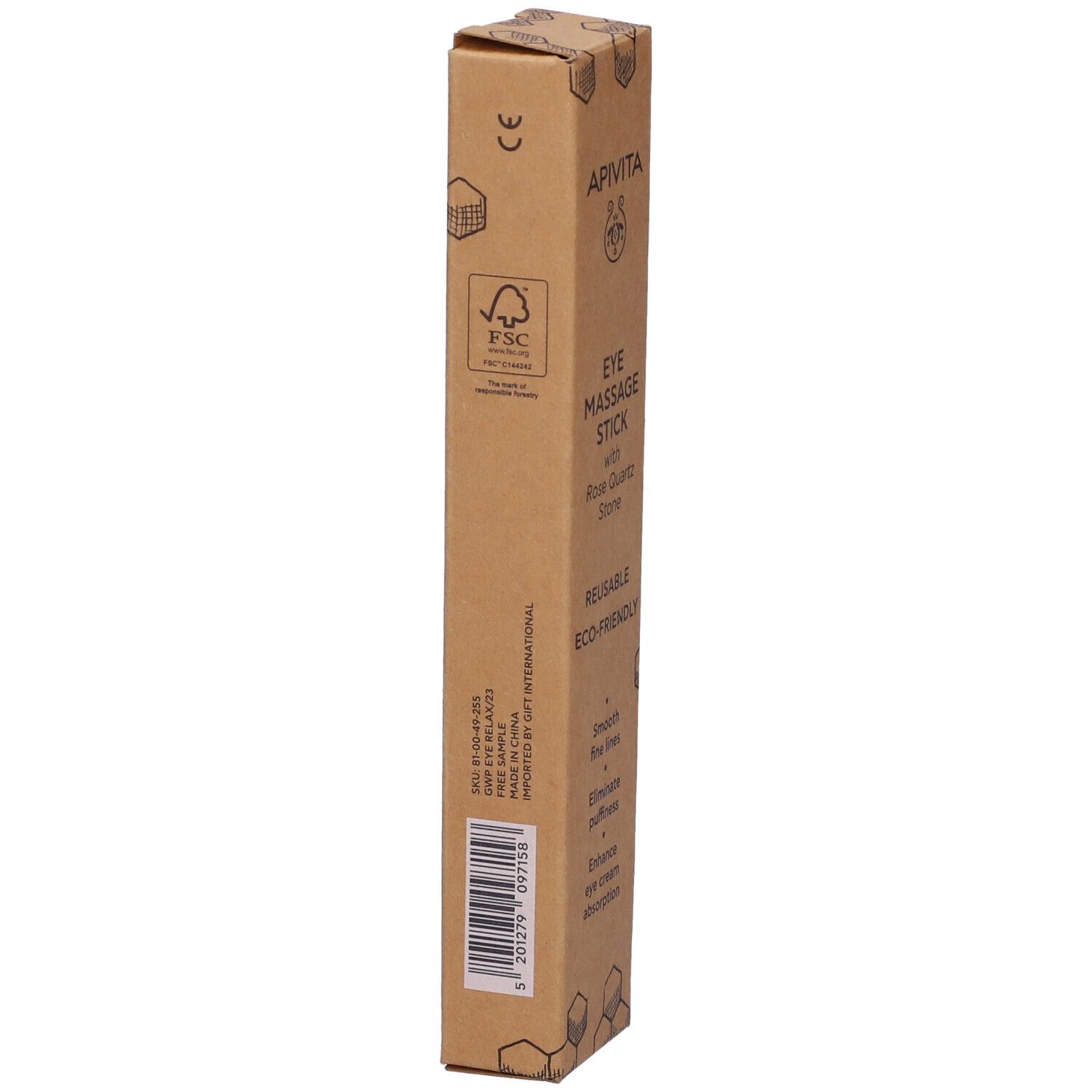 Confezione marrone con informazioni sul prodotto. Testo: EYE MASSAGE STICK. Certificazione FSC. Codice a barre e informazioni sull'importatore.