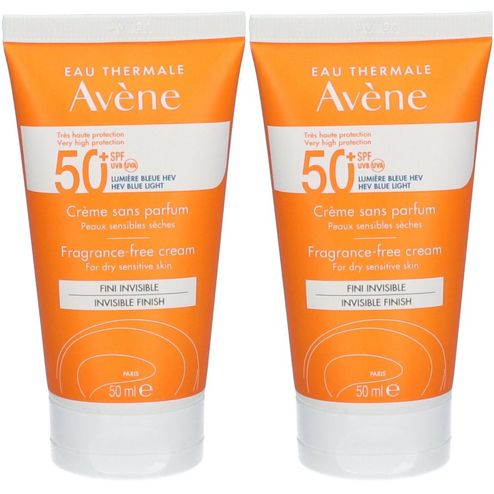 Due tubi di crema solare. Tubi arancioni con tappo bianco. Scritta: Eau Thermale Avène, SPF 50+, Crème sans parfum, Fini Invisible.