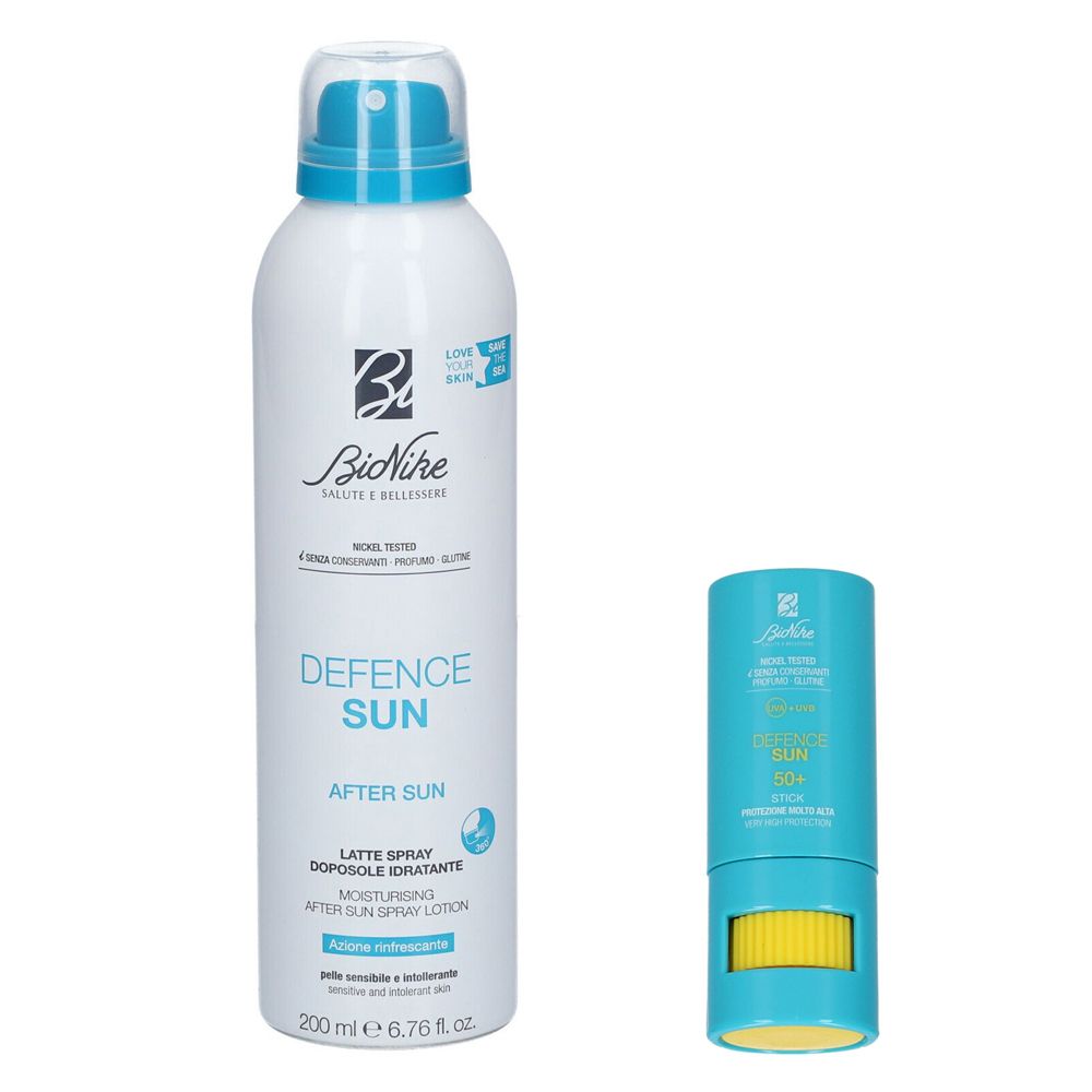 Due prodotti: un flacone spray bianco e uno stick turchese. Sul flacone c'è scritto "Defence Sun After Sun". Sulla stick c'è scritto "Defence Sun 50+".