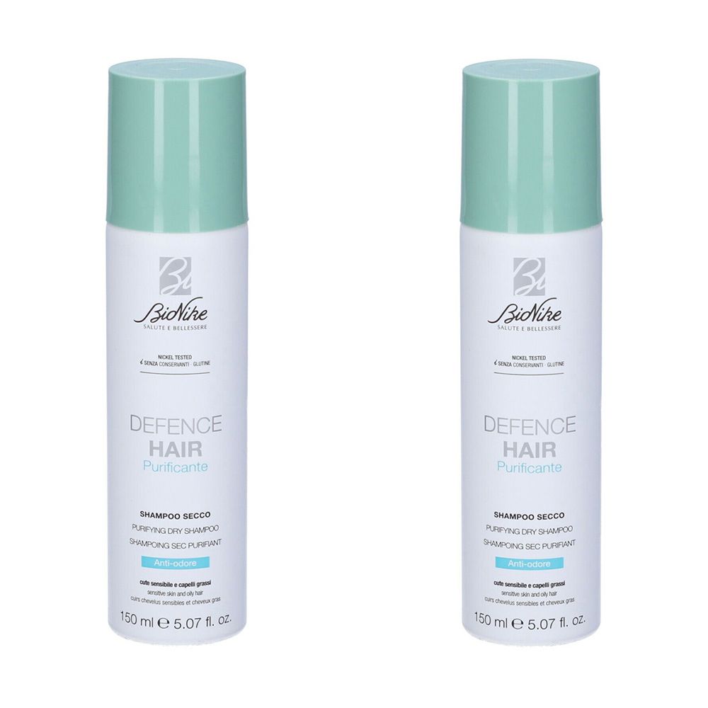 Due flaconi bianchi con tappi turchesi. Scritta: BioNike Defence Hair Purificante Shampoo Secco. 150 ml.