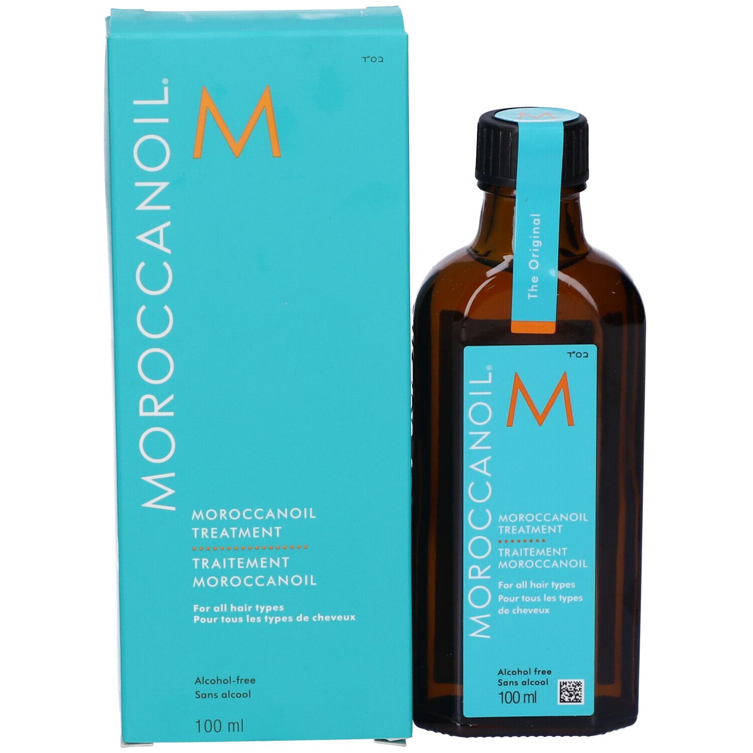 Confezione turchese e flacone marrone. MOROCCANOIL sulla confezione. MOROCCANOIL TREATMENT sul flacone.