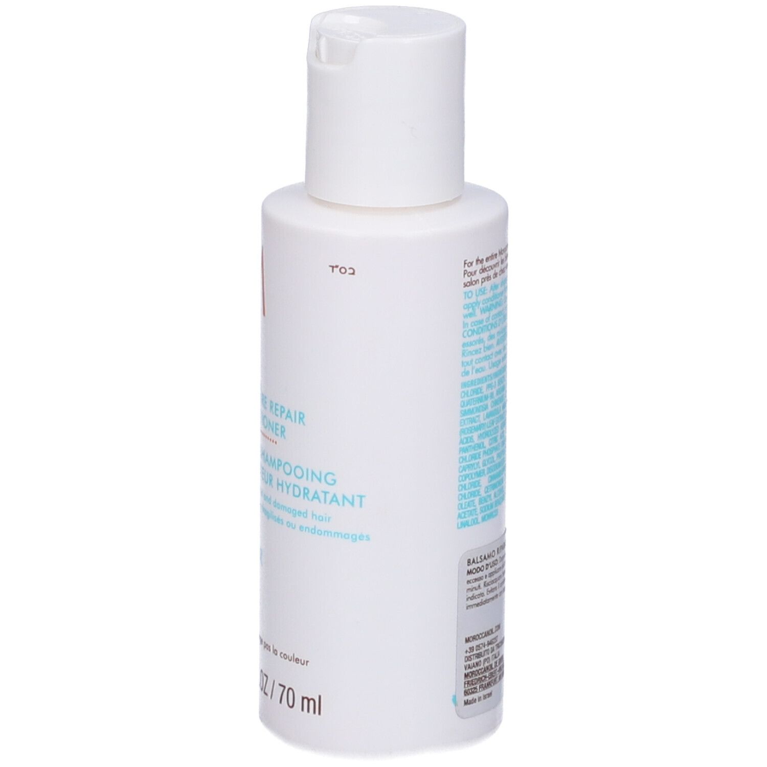 Flacone bianco con tappo a ribalta. Retro con testo in più lingue. Scritta: Moroccanoil.