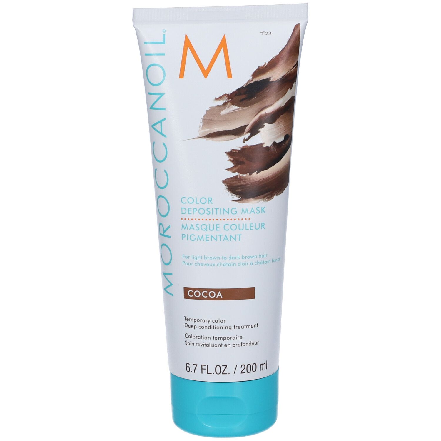 Tubo bianco-marrone con tappo turchese. Scritta: Moroccanoil, Color Depositing Mask, Cocoa. 6.7 FL.OZ./200 ml.