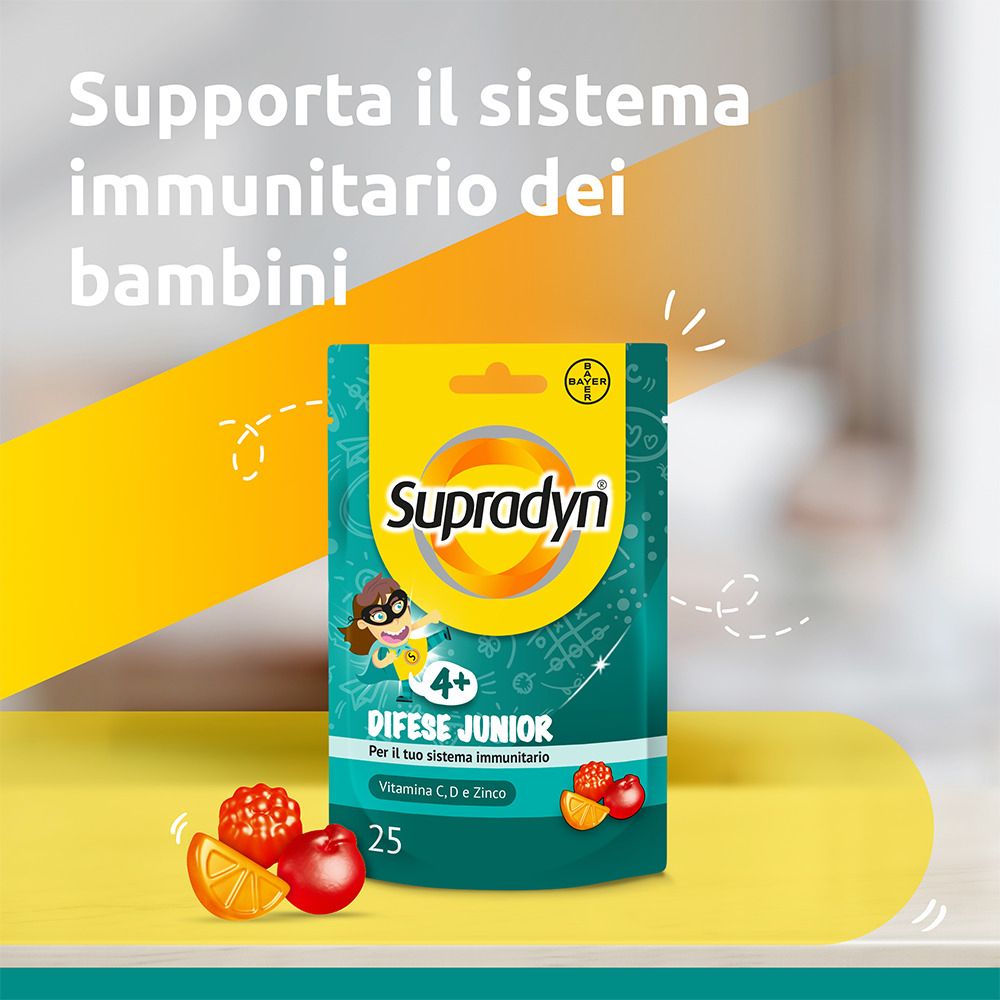 Una confezione di Supradyn Difese Junior. Scritto: 4+, Difese Junior, Vitamina C, D e Zinco, 25 pezzi. Sfondo giallo.