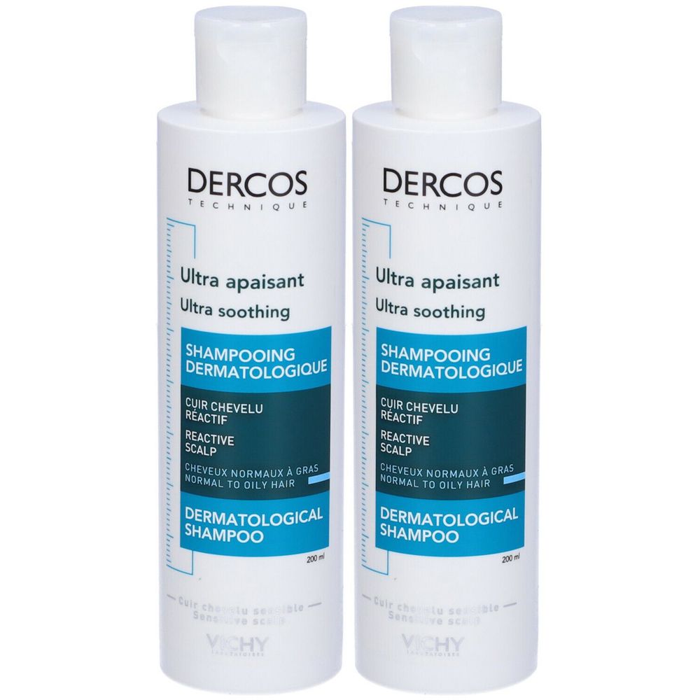 Due flaconi bianchi di shampoo con scritte blu e nere. Scritte: Dercos, Ultra apaisant, Shampooing dermatologique. Per capelli normali e grassi.