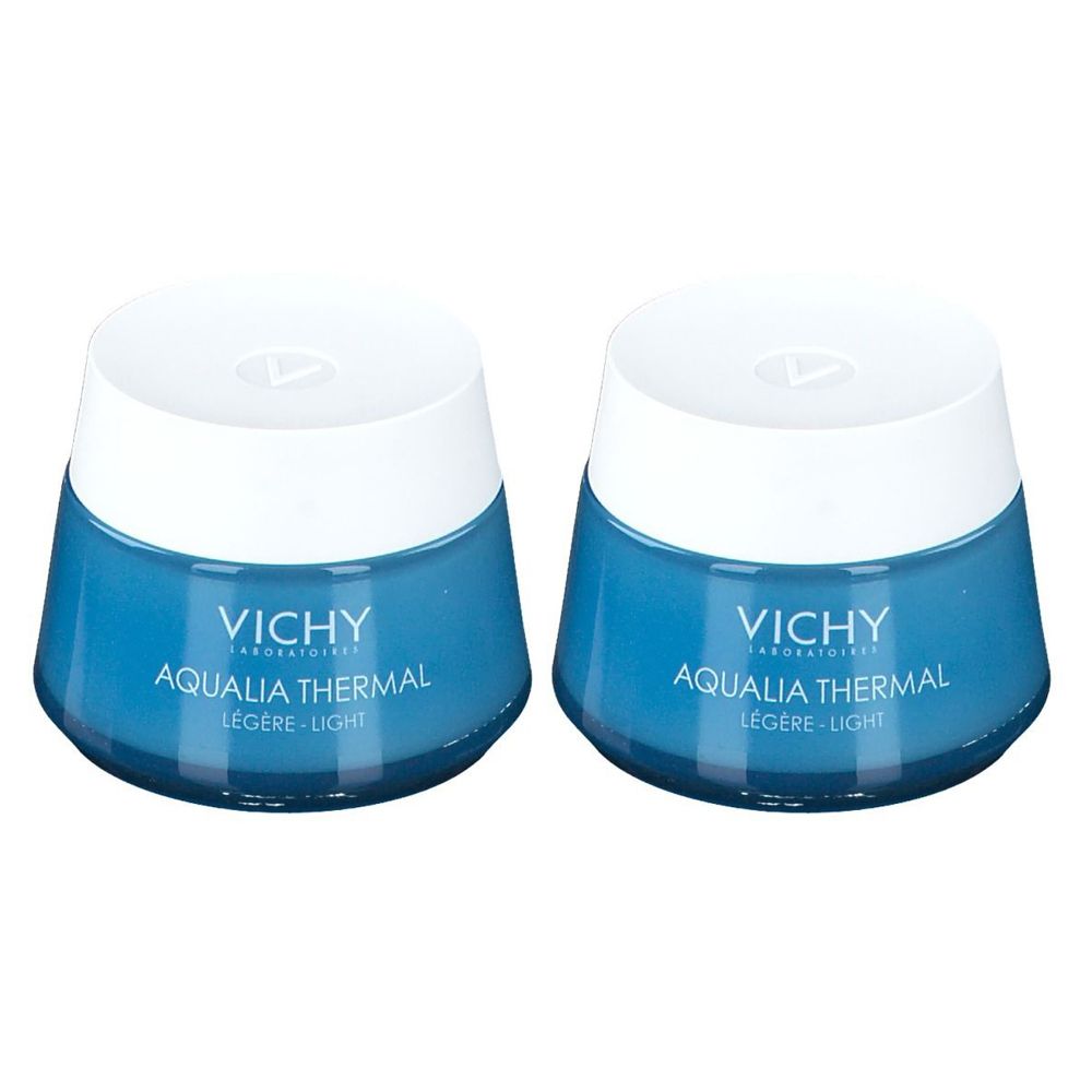 Due vasetti di crema blu con coperchi bianchi. Scritta: Vichy Aqualia Thermal Légère-Light.