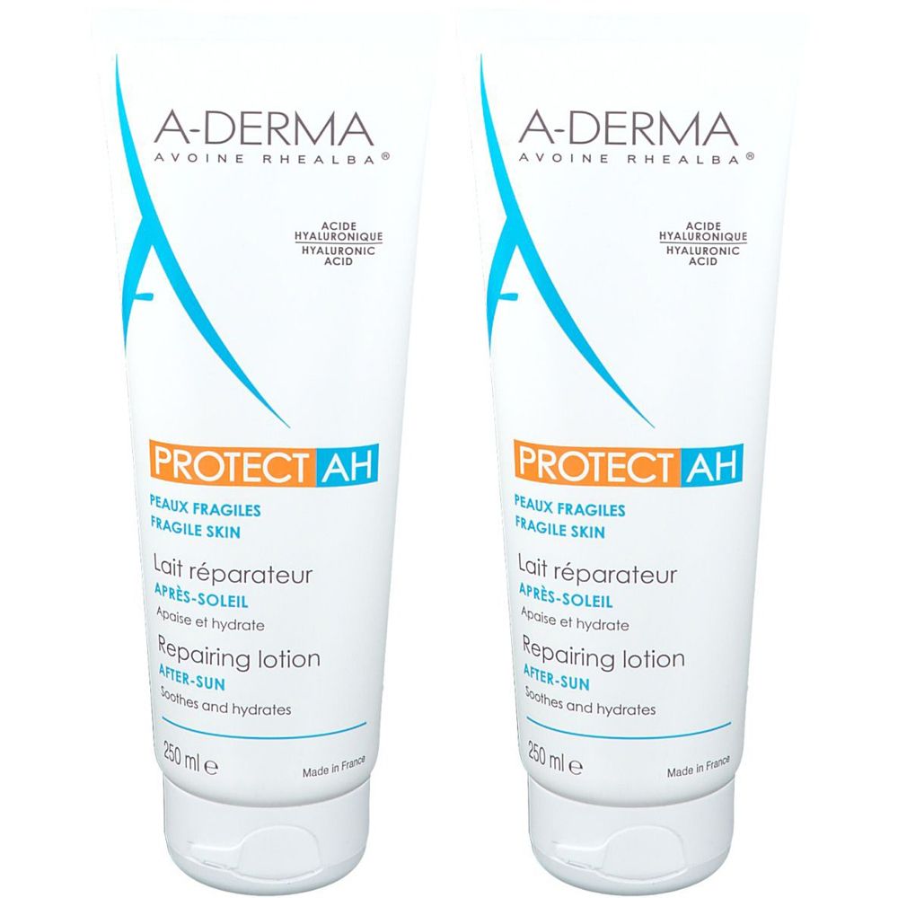 Due tubi di lozione doposole A-DERMA Protect AH. Tubi bianchi con grafica blu e informazioni sul prodotto. 250 ml.