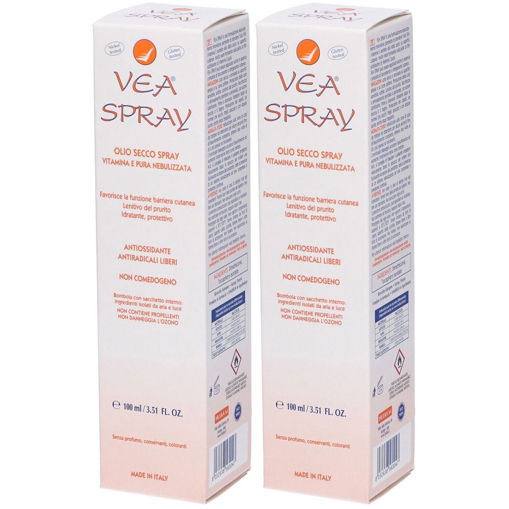 Due scatole bianche con testo. Scritto: VEA Spray, Olio Secco Spray, vitamina E e pura nebulizzata. 100 ml.