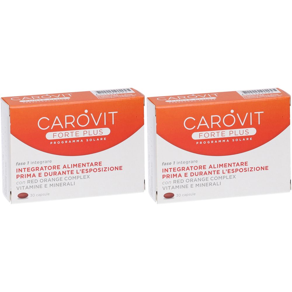 Due confezioni di CAROVIT FORTE PLUS. Scritta: Integratore Alimentare Prima e Durante l'Esposizione. Complesso Arancia Rossa.