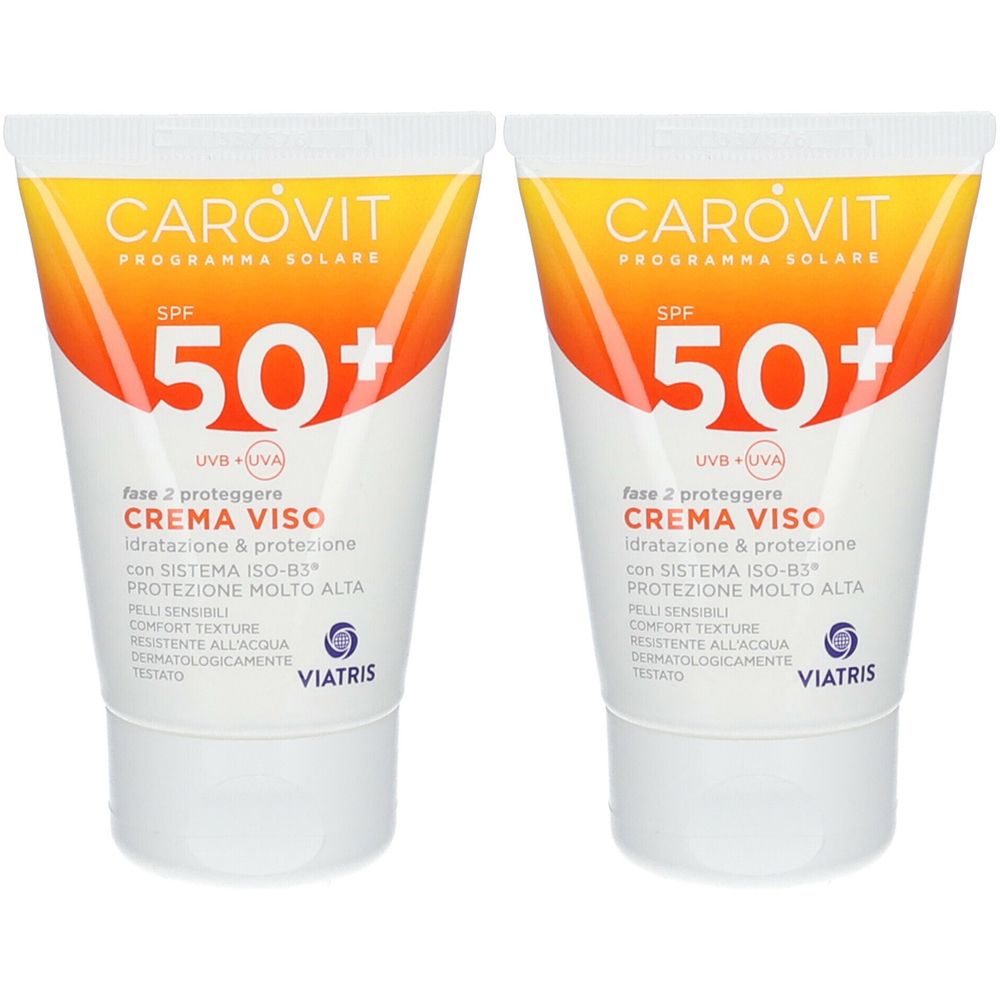 Due tubi di crema solare CAROVIT SPF 50+. Tubi bianchi con etichetta giallo-arancio. Testo: CREMA VISO, VIATRIS.