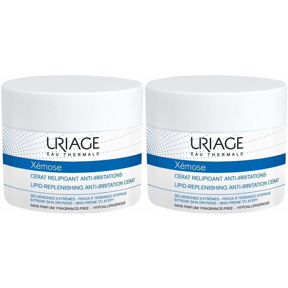 Due vasetti bianchi con scritte blu e bianche. Scritta: URIAGE, Xémose, Cerat Relipidant Anti-Irritations. Senza profumo, ipoallergenico.