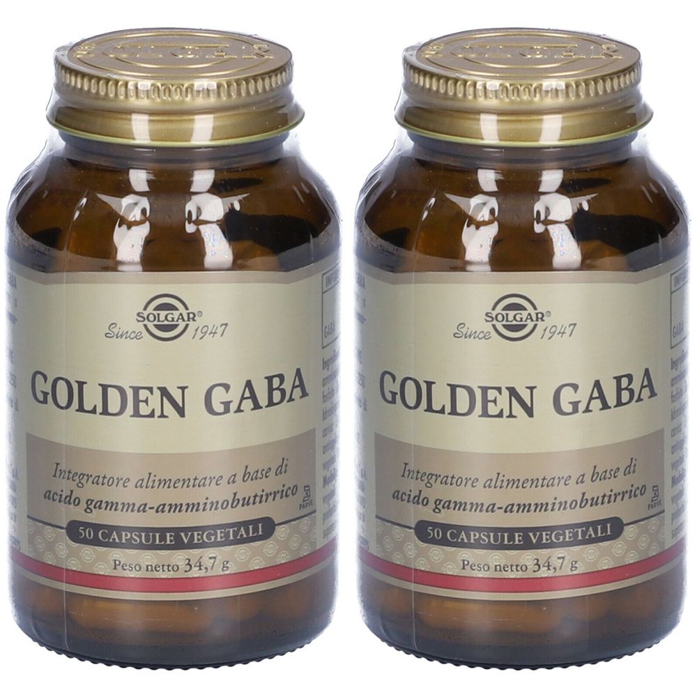 Due bottiglie di vetro marrone con tappi dorati. Etichette con "GOLDEN GABA" e "50 CAPSULE VEGETALI". Marchio: SOLGAR.