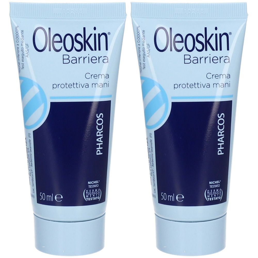 Due tubi di crema mani. Sfondo azzurro chiaro, testo blu scuro. Scritta: Oleoskin Barriera, Crema protettiva mani, PHARCOS.